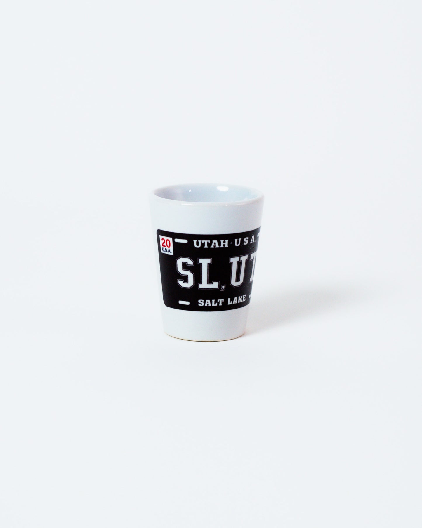 Black Plate White Ceramic Shot Glass