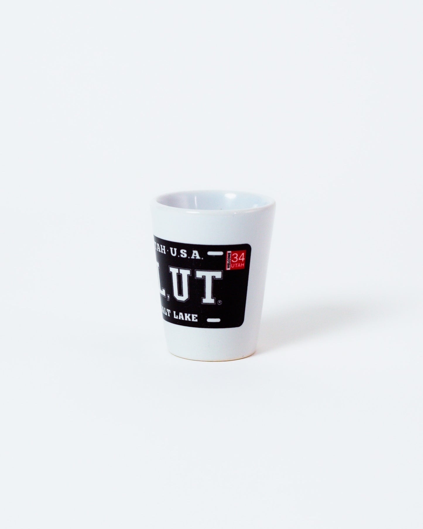 Black Plate White Ceramic Shot Glass